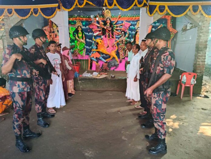 হরিপুরে দুর্গাপূজায় বিজিবির নিরাপত্তা হরিপুরে দুর্গাপূজার নিরাপত্তায় বিজিবির নজরদারি ও টহল